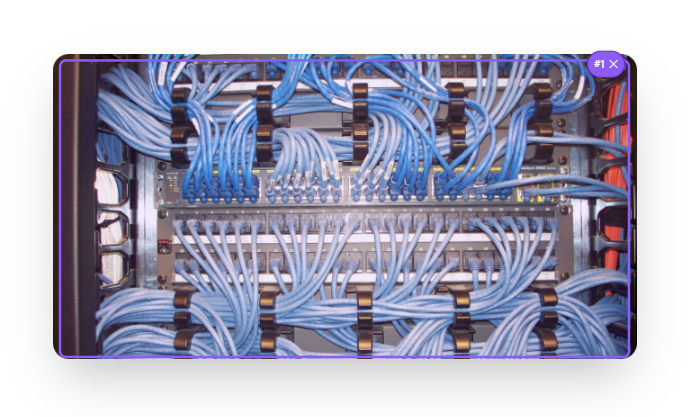 IT technician crimping ethernet network cable